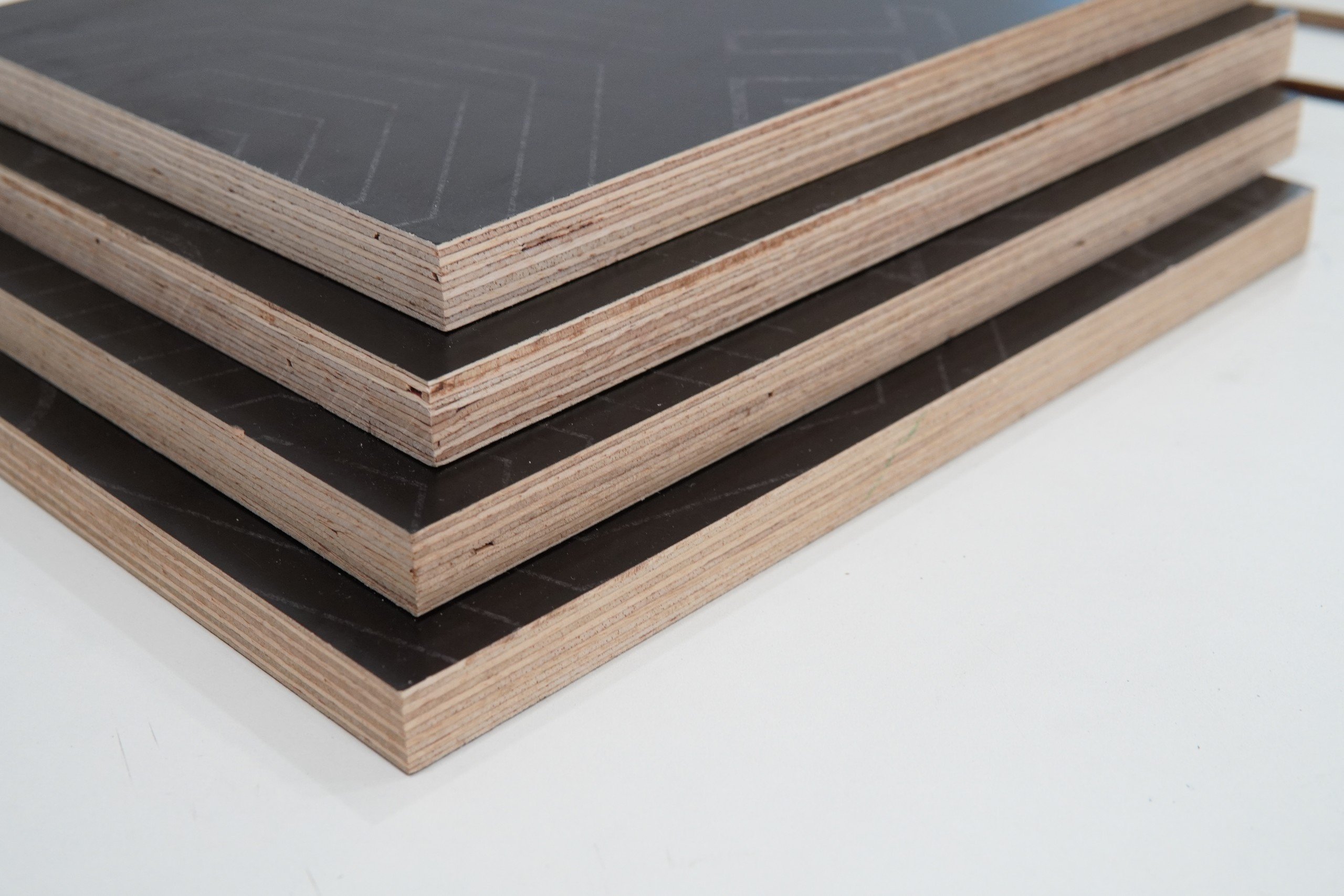 EZ Form rubberwood film faced formwork plywood panels showing phenolic surface and veneer layers