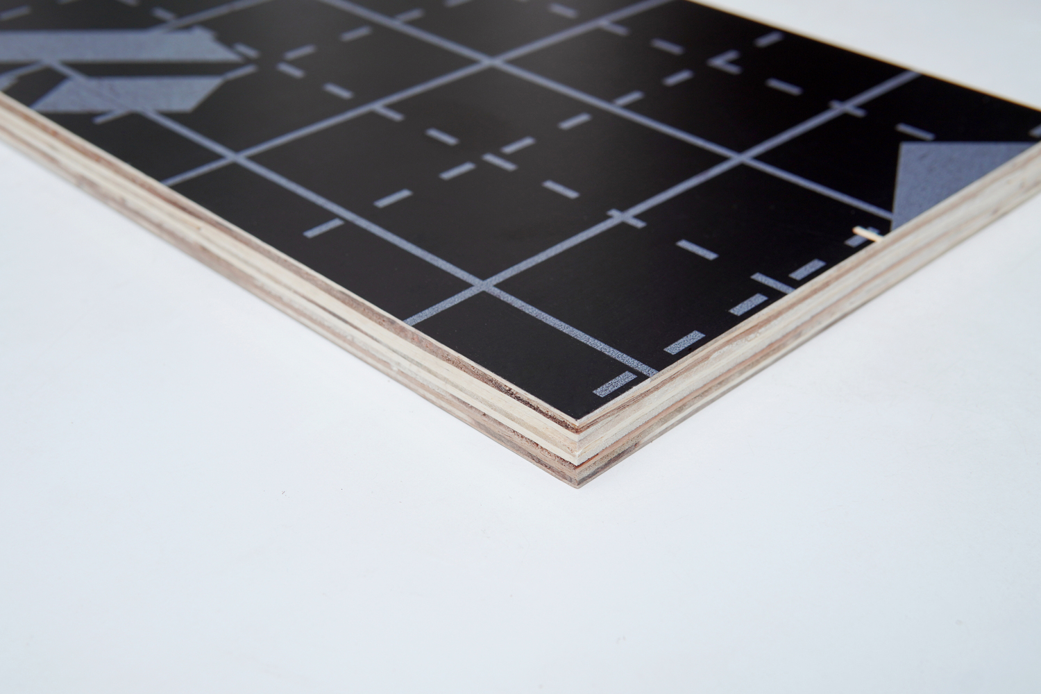 Lite Form lightweight film faced plywood panel showing phenolic surface and mixed hardwood veneer core